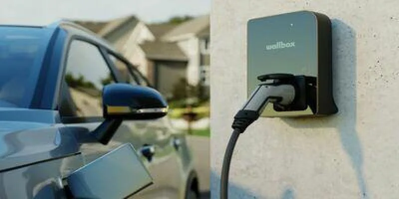 Carro elétrico conectado a um carregador de parede (imagem ilustrativa)